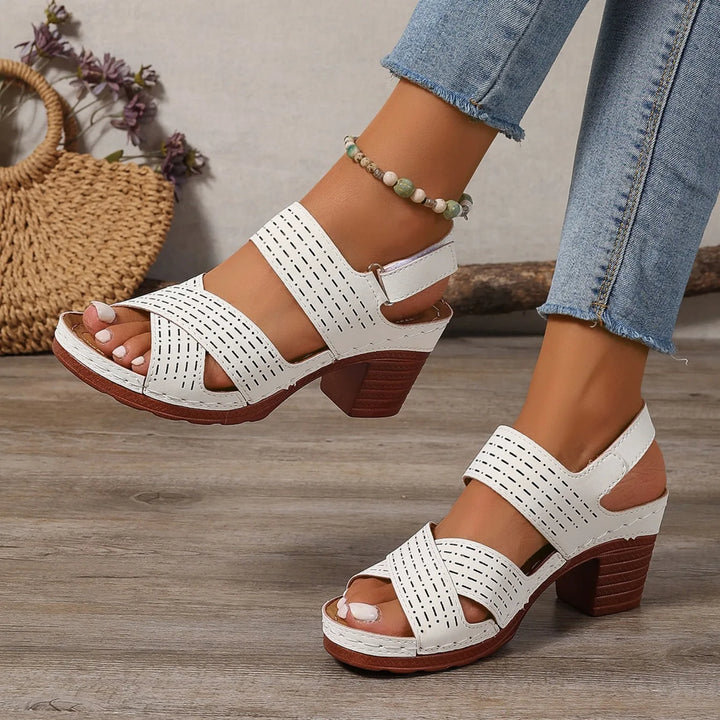 View from above of women's comfortable block heel sandals, showcasing the crisscross design