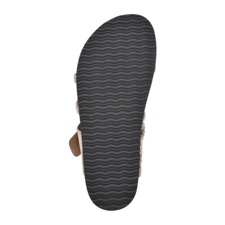 Women's slip-on braided sandals featuring an adjustable buckle, flat sole, and arch support for comfort.