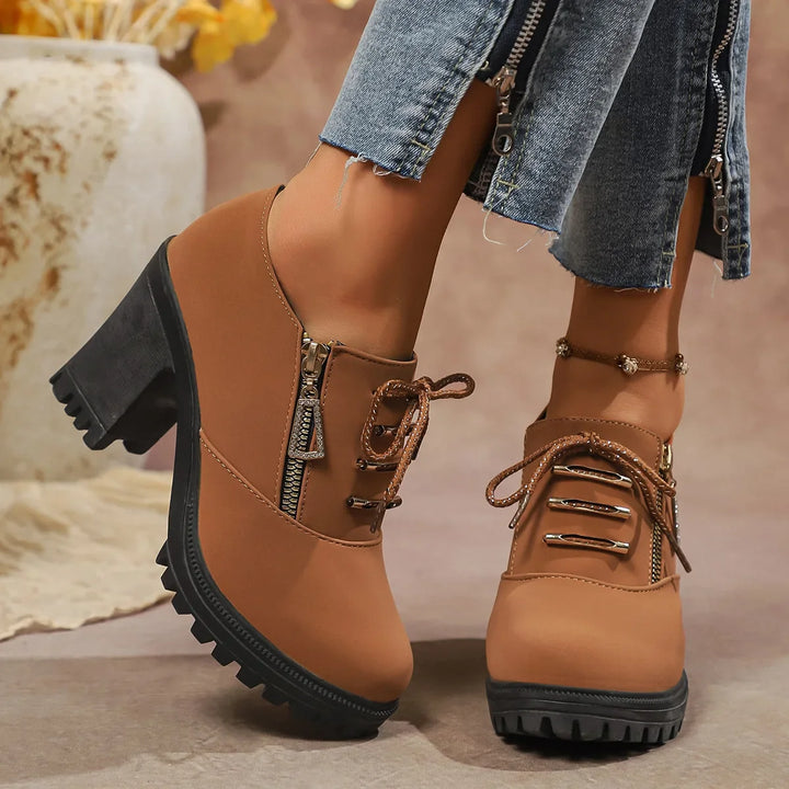 Collection of women's block heel boots in brown and black, emphasizing comfort and various styles.