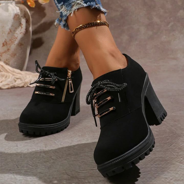 Detail of the soft interior of a women's comfortable block heel boot, designed for all-day wear.