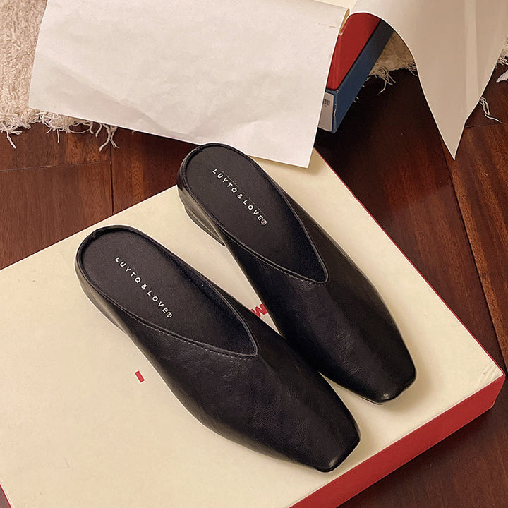 Silver vegan leather slip-on flats, comfortable and stylish for women's versatile casual footwear.