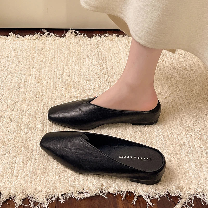 Everyday women's comfortable slip-on flats made from durable vegan leather, available in brown.