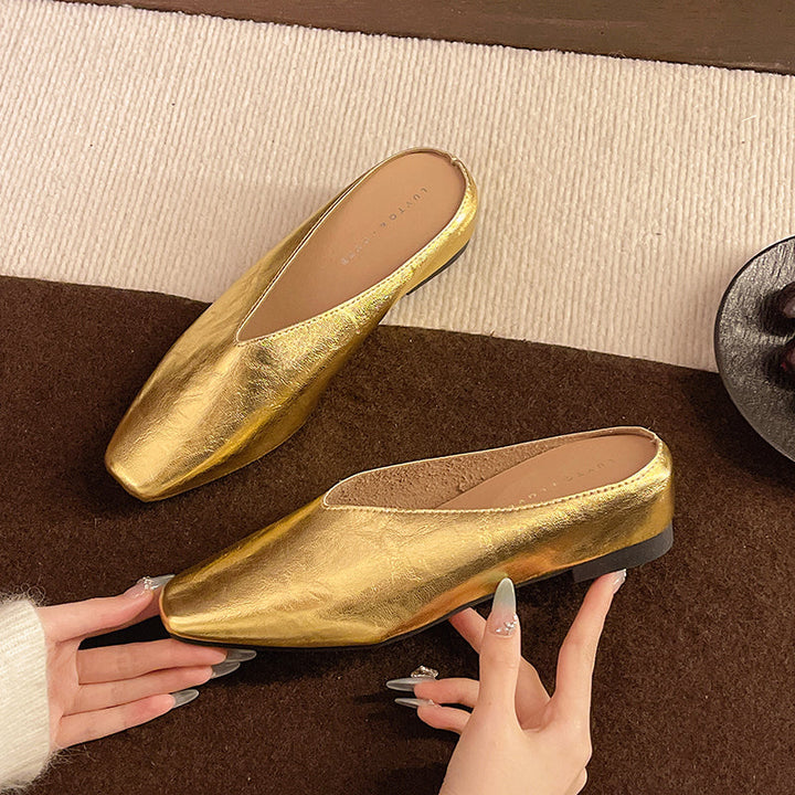 Versatile black vegan leather women's flats, easy slip-on design for ultimate comfort and style.