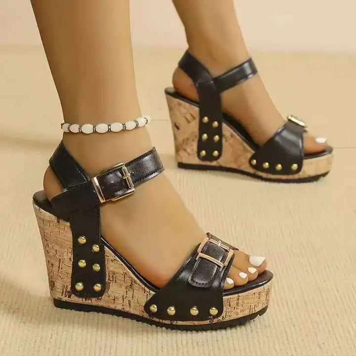 Detail of the soft straps and secure buckle on women's casual wedge sandals for ultimate comfort