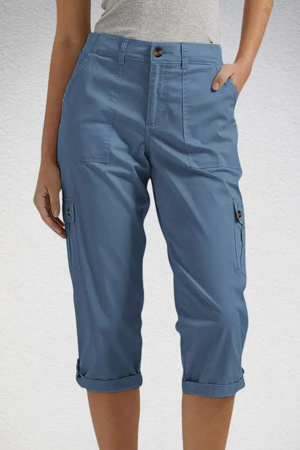 Women's travel-friendly cropped cargo pants, lightweight with practical pockets for adventures.