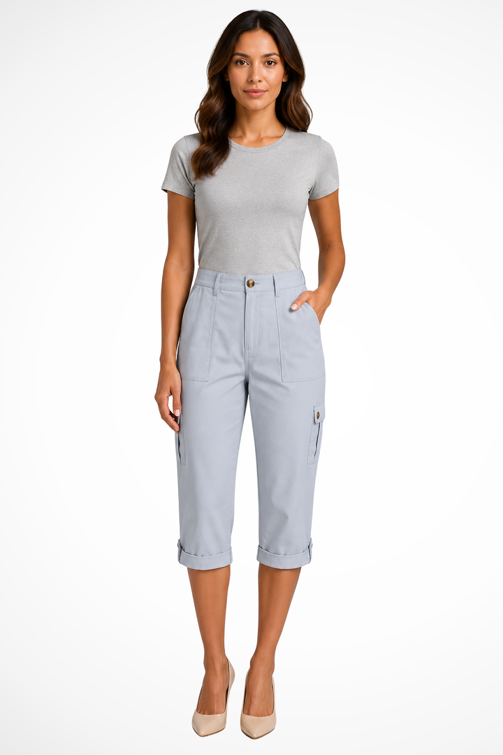 Detail of elastic waistband & drawstring on women's comfortable cropped cargo pants for adjustable fit.