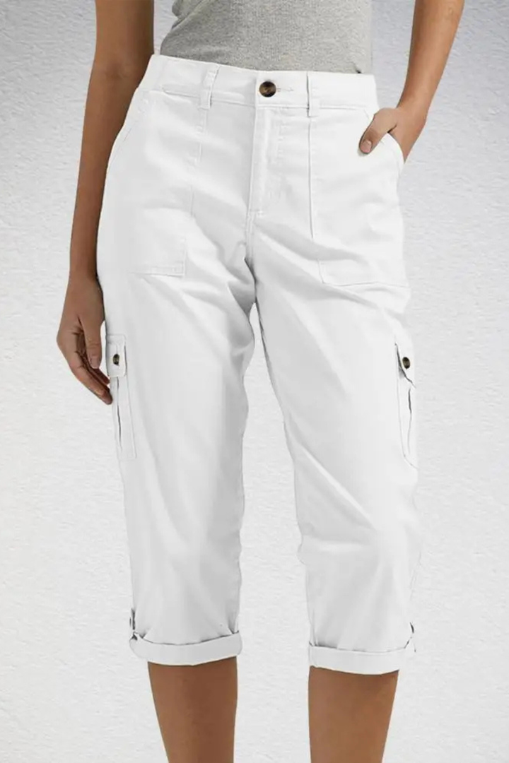 Women walking in comfortable cropped cargo pants, perfect for active casual wear & travel comfort.