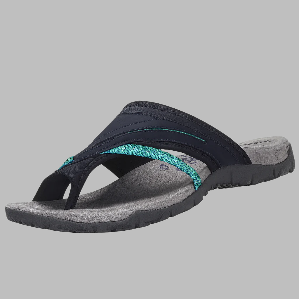 Women's comfortable cross strap flip-flop sandals. Slip-on summer footwear, perfect as beach shoes or casual slides.