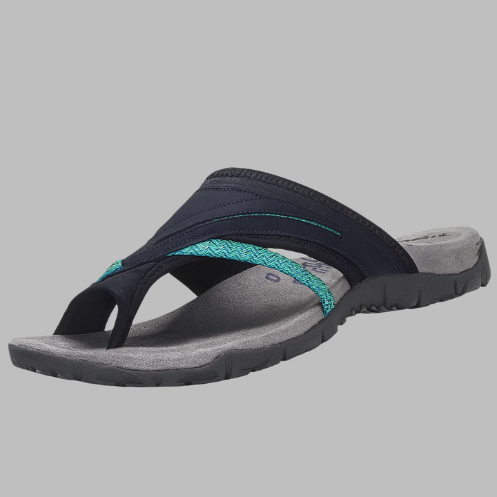 Women's comfortable cross strap flip-flop sandals. Slip-on summer footwear, perfect as beach shoes or casual slides.