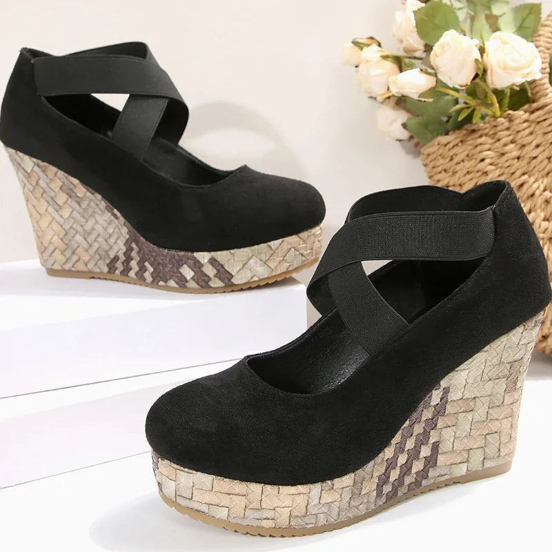 Full view of women's comfortable cross strap wedge sandals; essential orthopedic summer fashion footwear.