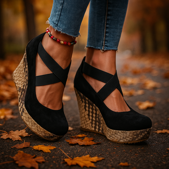 Stylish women's cross strap wedge sandals in black; comfortable, supportive design for summer fashion.
