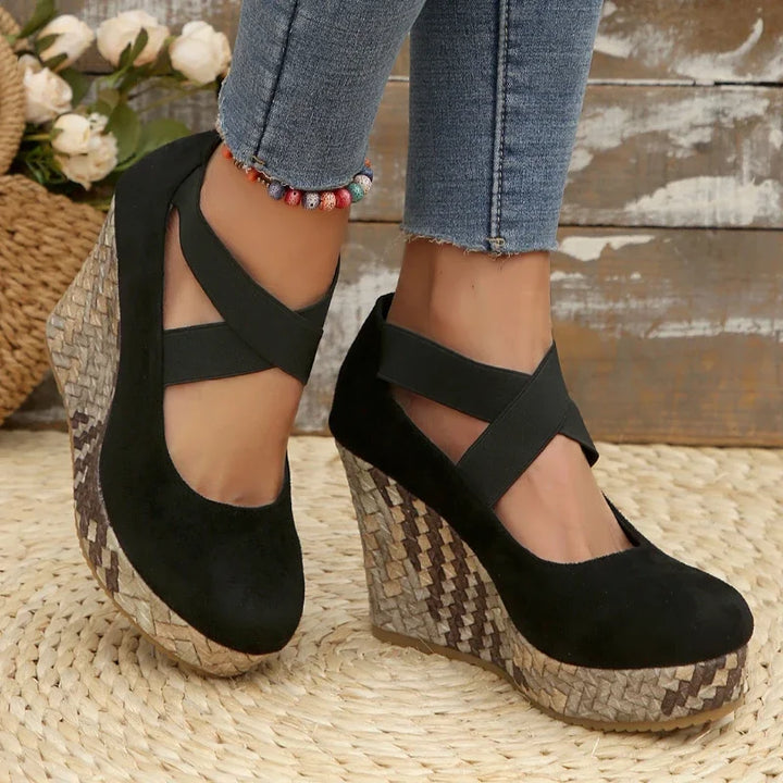 Side view of women's comfortable cross strap wedge sandals; orthopedic design, perfect summer footwear.