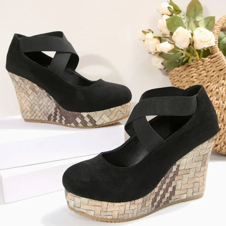 Elegant women's white cross strap wedge sandals; comfortable, supportive and fashionable summer shoes.