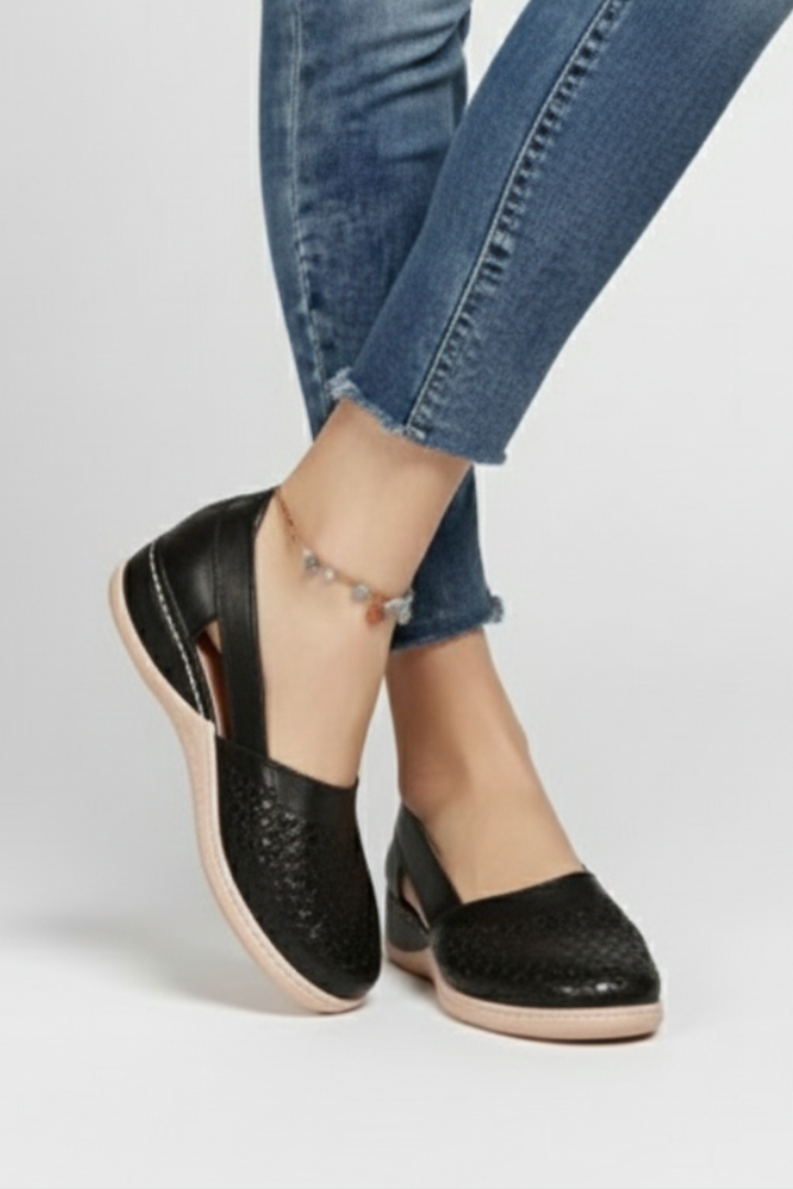 Modern women's everyday footwear featuring versatile cut-out designs for comfort and style.