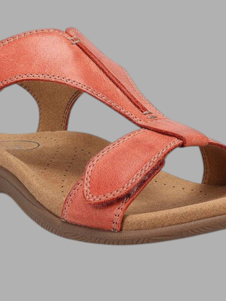 Stylish open-toe women's slip-on sandals, perfect for comfortable everyday casual wear.
