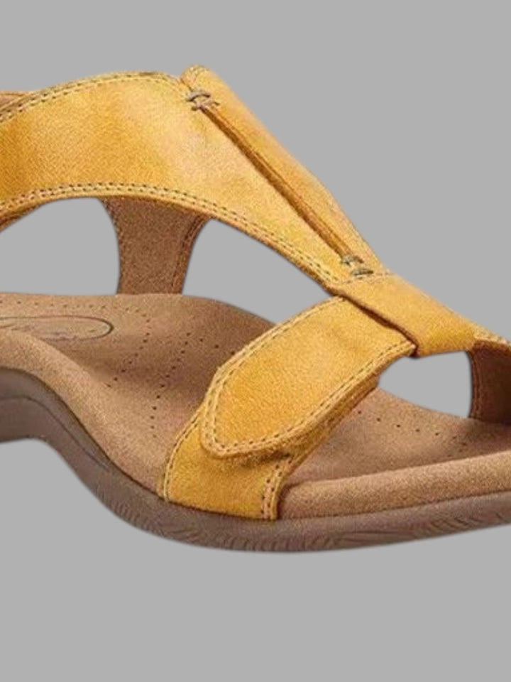 Versatile women's slip-on sandals, comfortable & stylish for everyday casual summer wear.