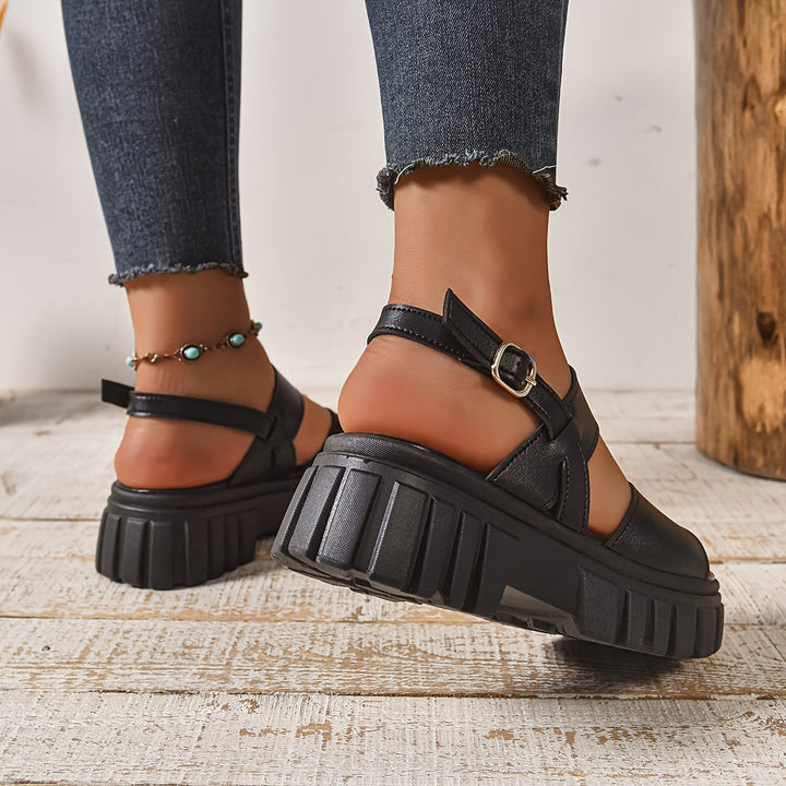 Casual women's flat sandals for all-day comfort, featuring an easy slip-on design for everyday wear.