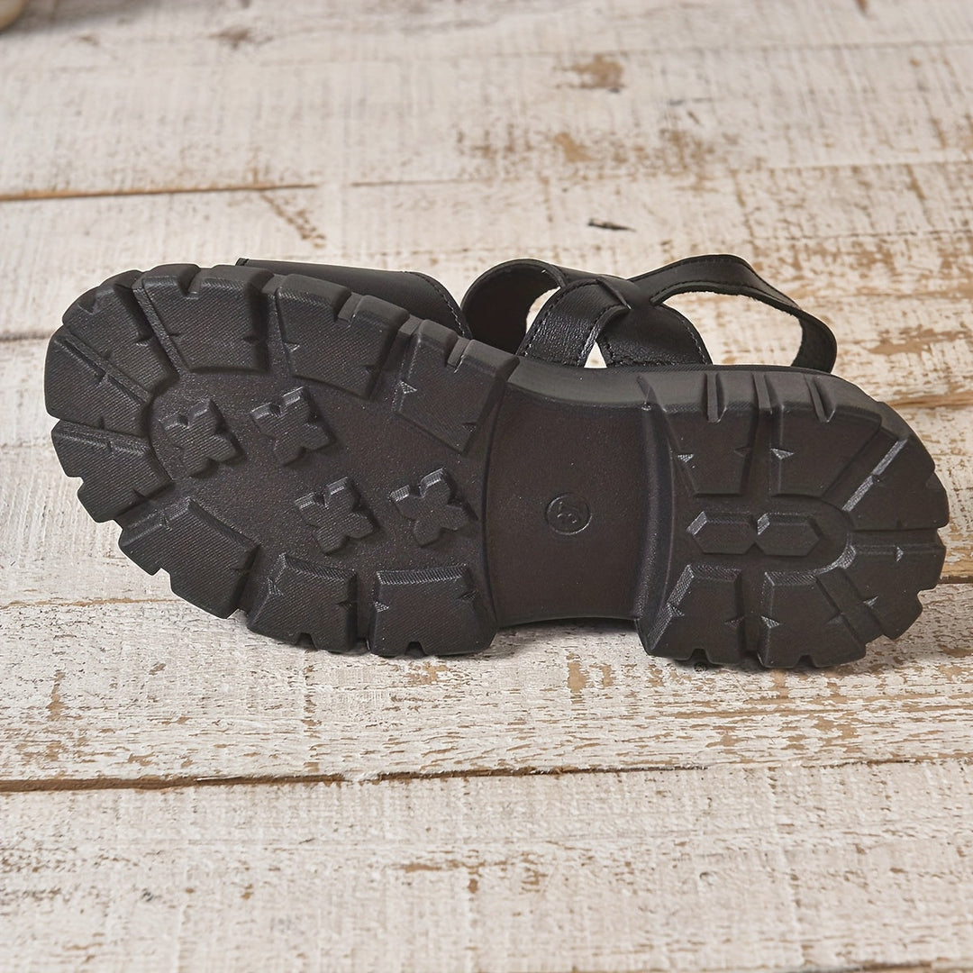 Slip-on women's flat sandals, a comfortable and casual footwear choice for versatile daily outfits.