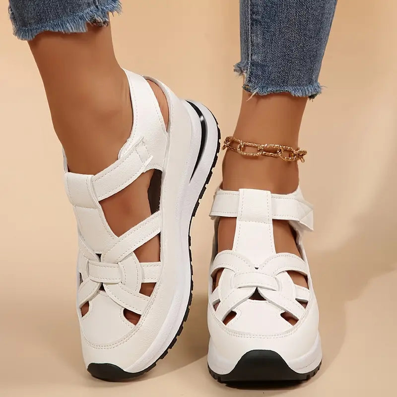 Casual women's flatform sandals with wide Velcro straps. Comfortable, open-toe design perfect for warm weather activities.