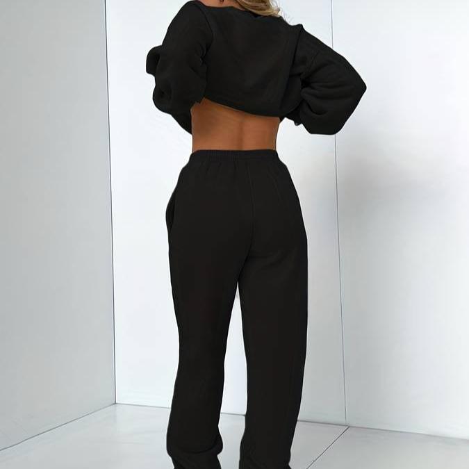 Matching women's athleisure jogger set in soft fabric, ideal for lounging or errands.