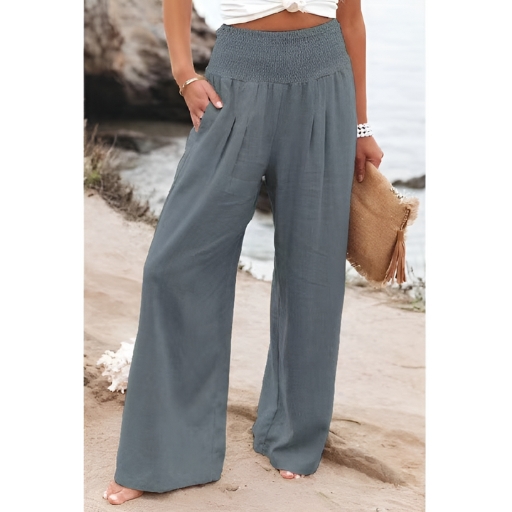Plus size women's high-waisted stretch linen trousers, comfortable and chic for spring & summer fashion.