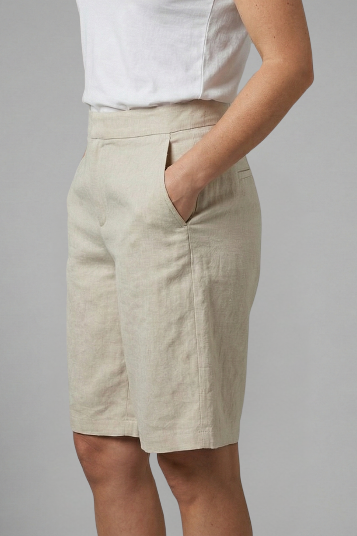 Summer-ready women's knee-length shorts, comfortable elastic waist, mid-rise, and side pockets for casual days.