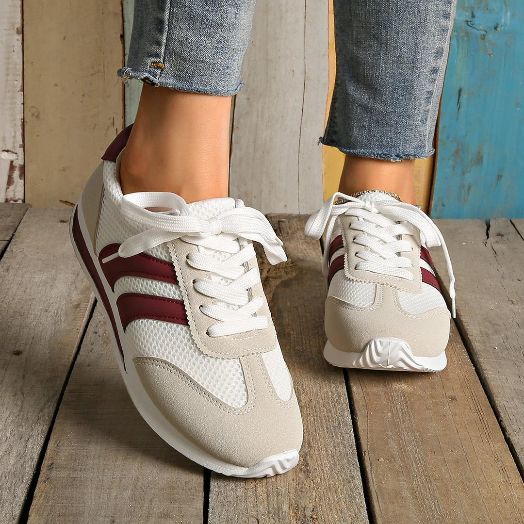 Orange & purple women's low-top lace-up athletic sneakers, comfortable casual footwear.