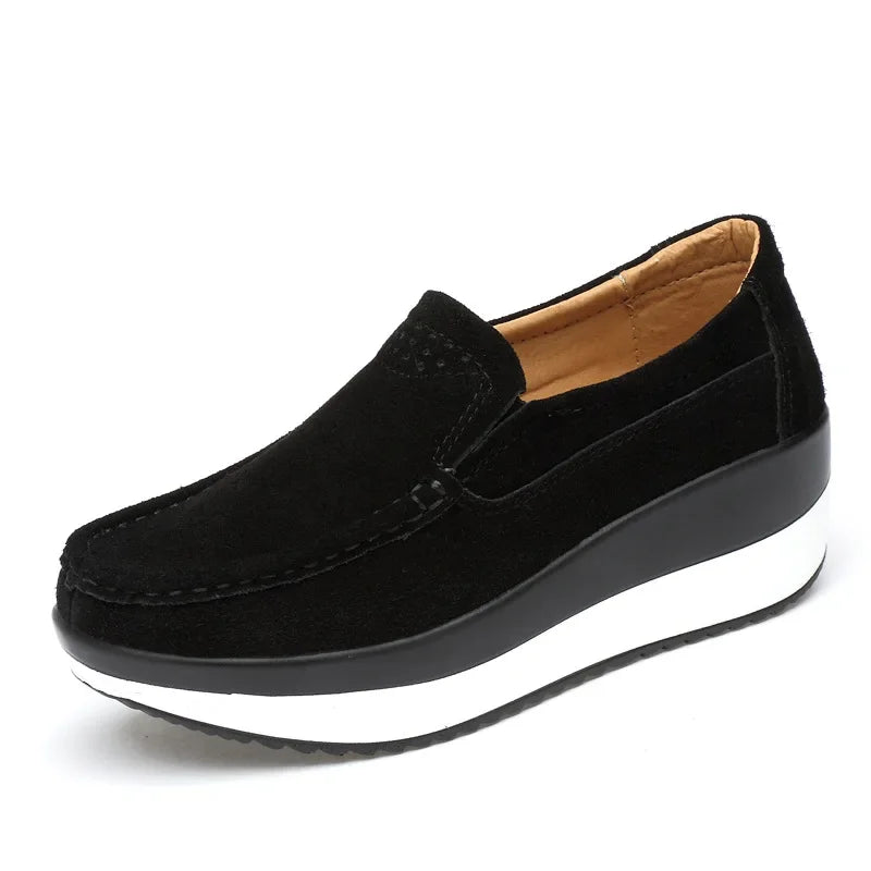 Practical women's navy suede slip-on loafers for everyday comfort, featuring an orthopedic sole