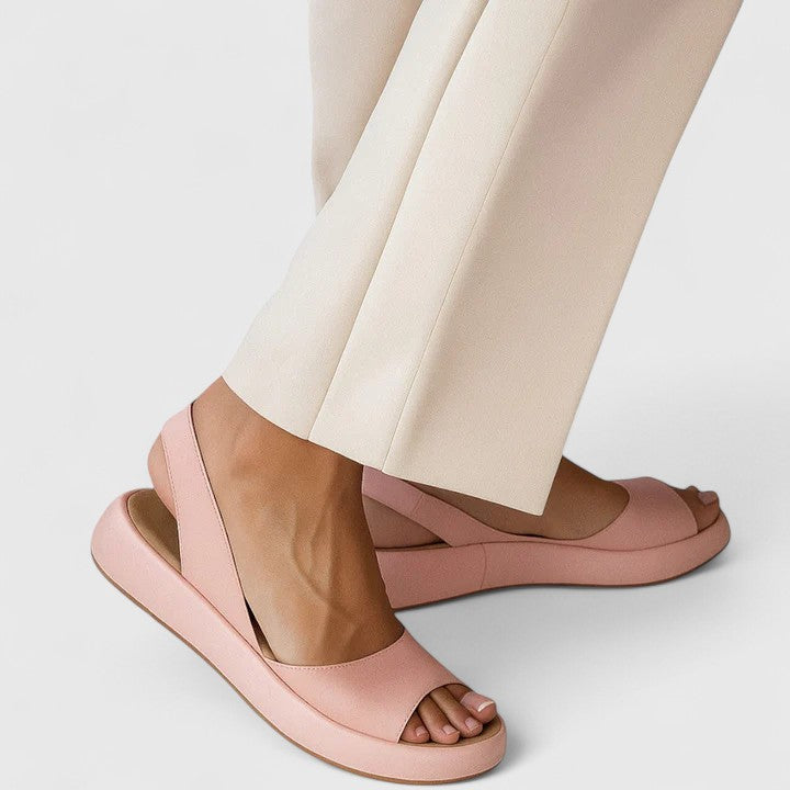 Women's comfortable orthopedic arch support sandals for foot pain relief.