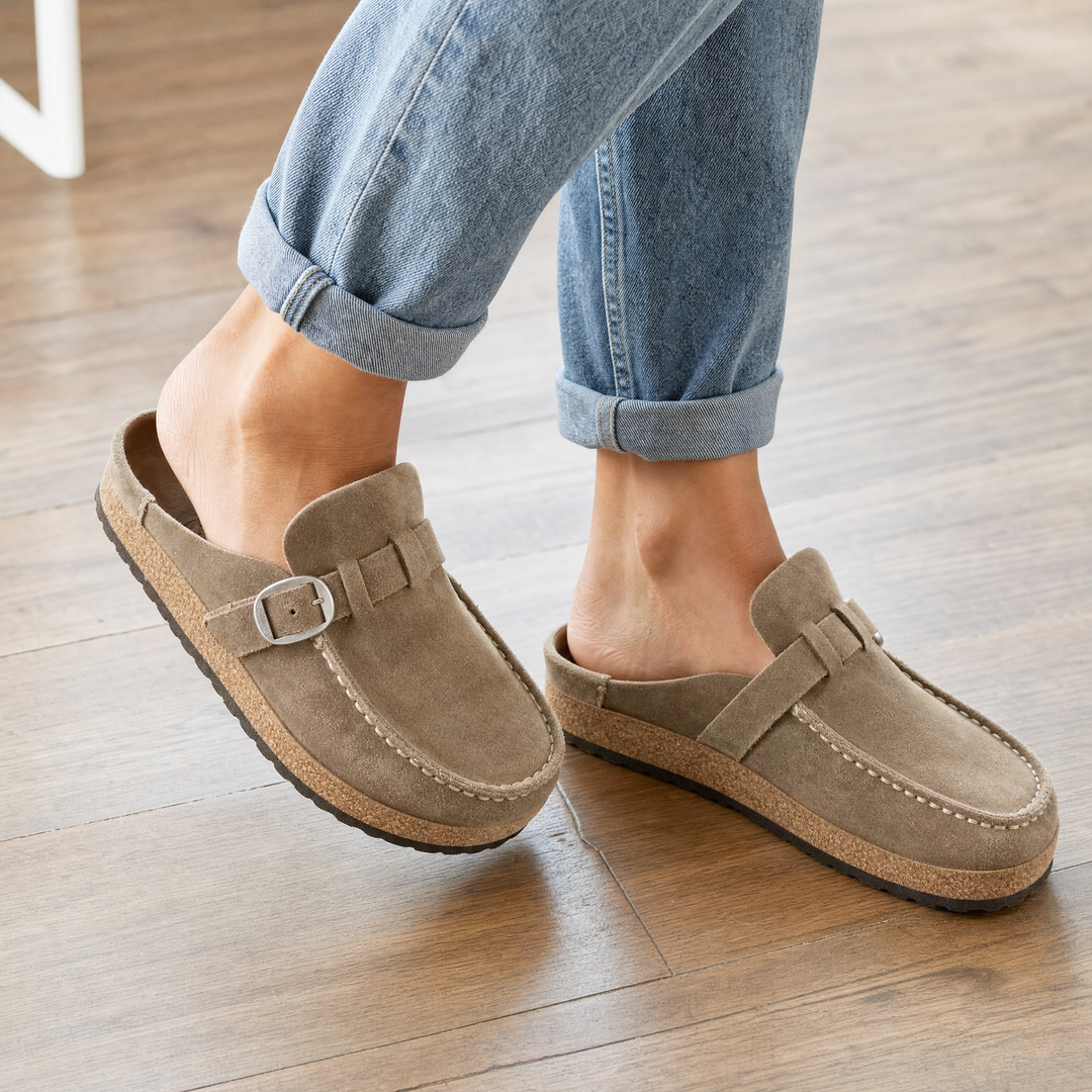Ergonomic orthopedic mules for women, providing comfortable all-day support and easy slip-on style.