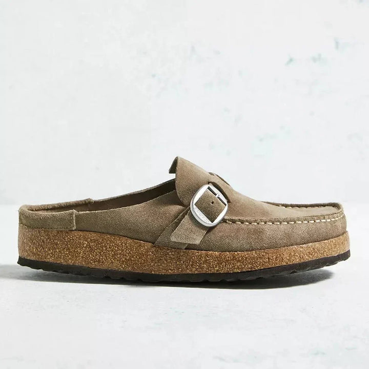 Orthopedic women's mules, engineered for superior arch support & comfort in a convenient slip-on style.
