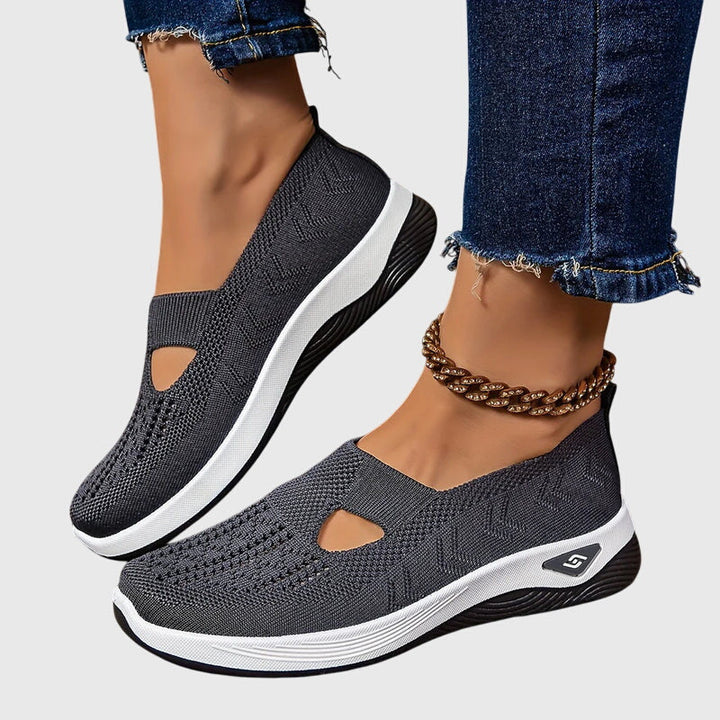 Side view of women's stylish orthopedic slip-on shoes, designed for posture correction & comfort.