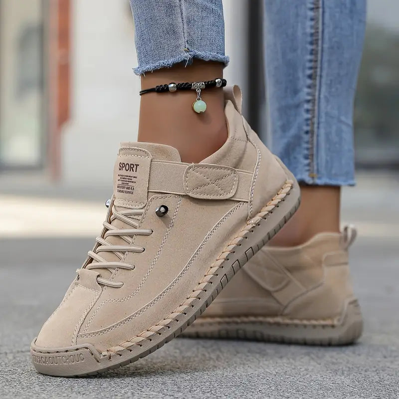Women's comfortable orthopedic sneakers in a light color, perfect for all-day support.