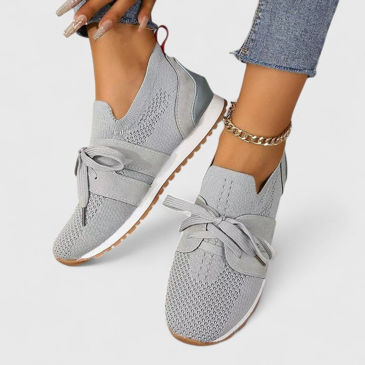 Breathable women's slip-on orthopedic sneakers with non-slip sole & arch support for casual walks.