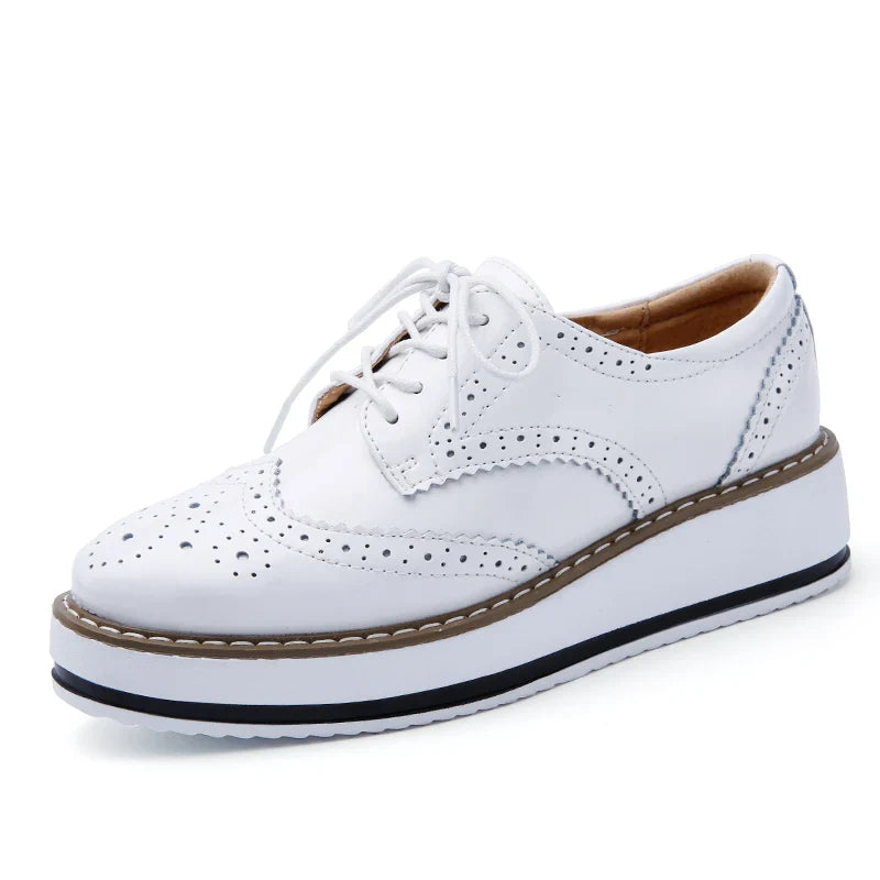 Women's comfortable platform oxfords from a top-down view, showing the full design and perforated upper.