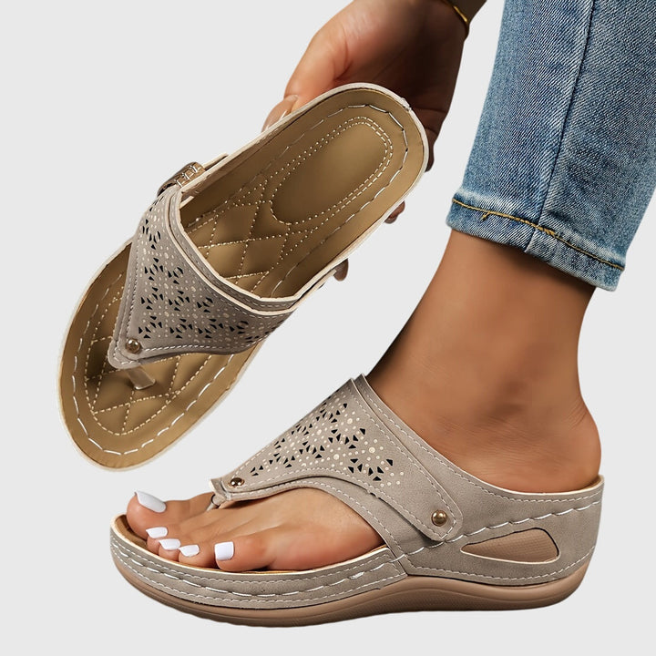 Chic women's platform sandals with a comfortable ankle strap, perfect for stylish summer outfits.