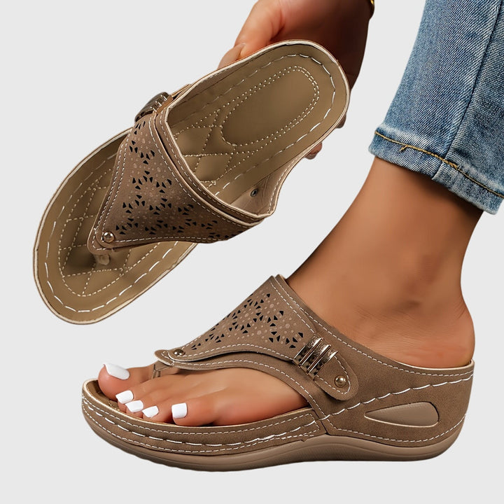 Stylish women's platform sandals with comfortable ankle strap, designed for elegant summer footwear.