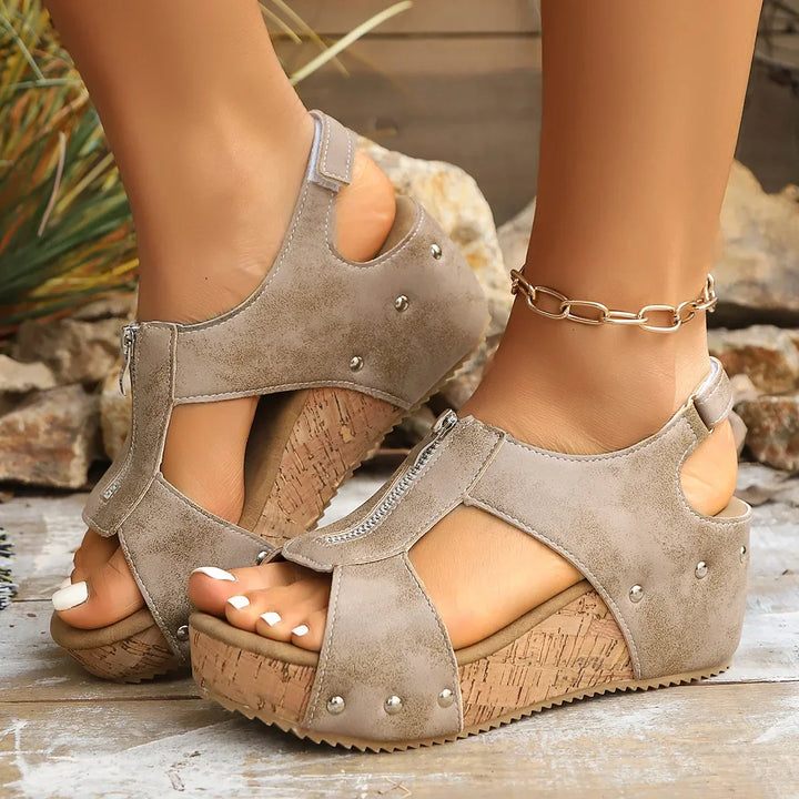 Summer-ready women's platform sandals with a convenient front zip and wedge heel