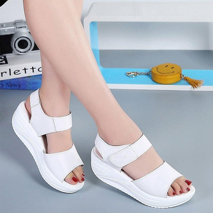 Stylish women's platform wedge sandals, offering comfort and support for summer activities