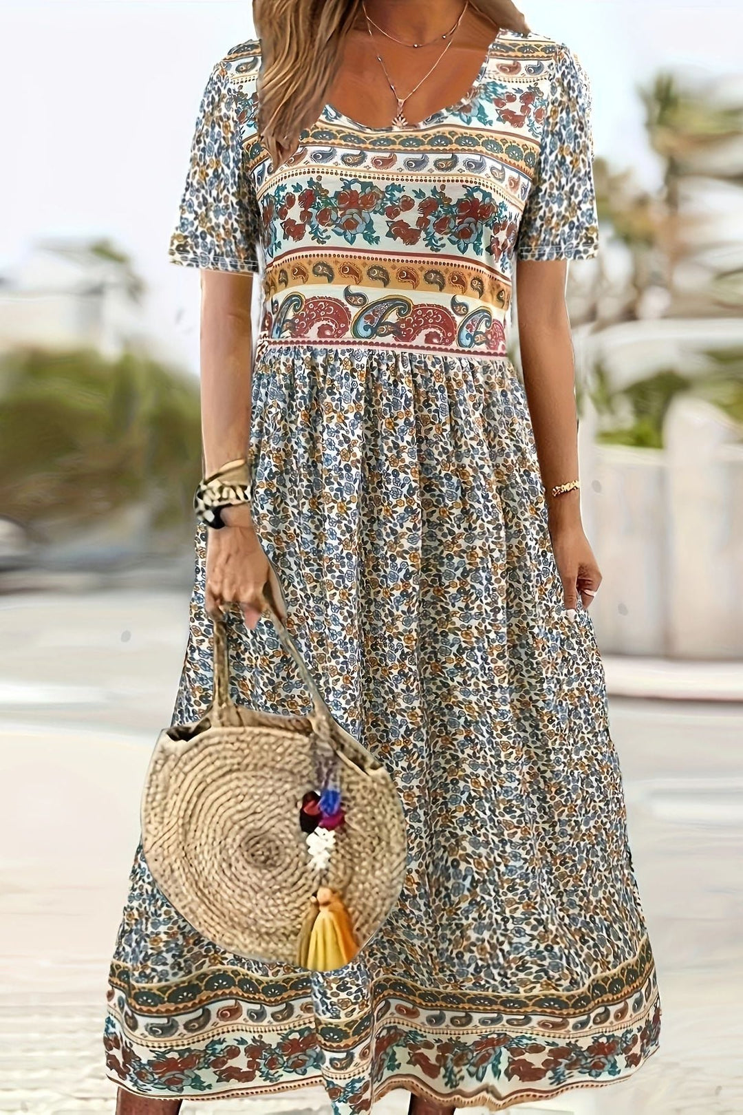 Stylish women's printed midi dress. Knee-length, comfortable & versatile for summer, casual, or work environments.