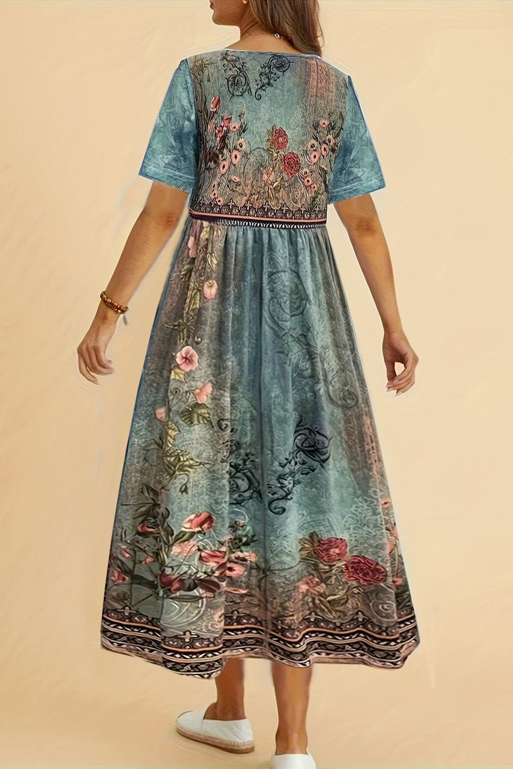 Comfortable women's versatile midi dress. Printed, knee-length, perfect for summer, work, or elegant casual wear.
