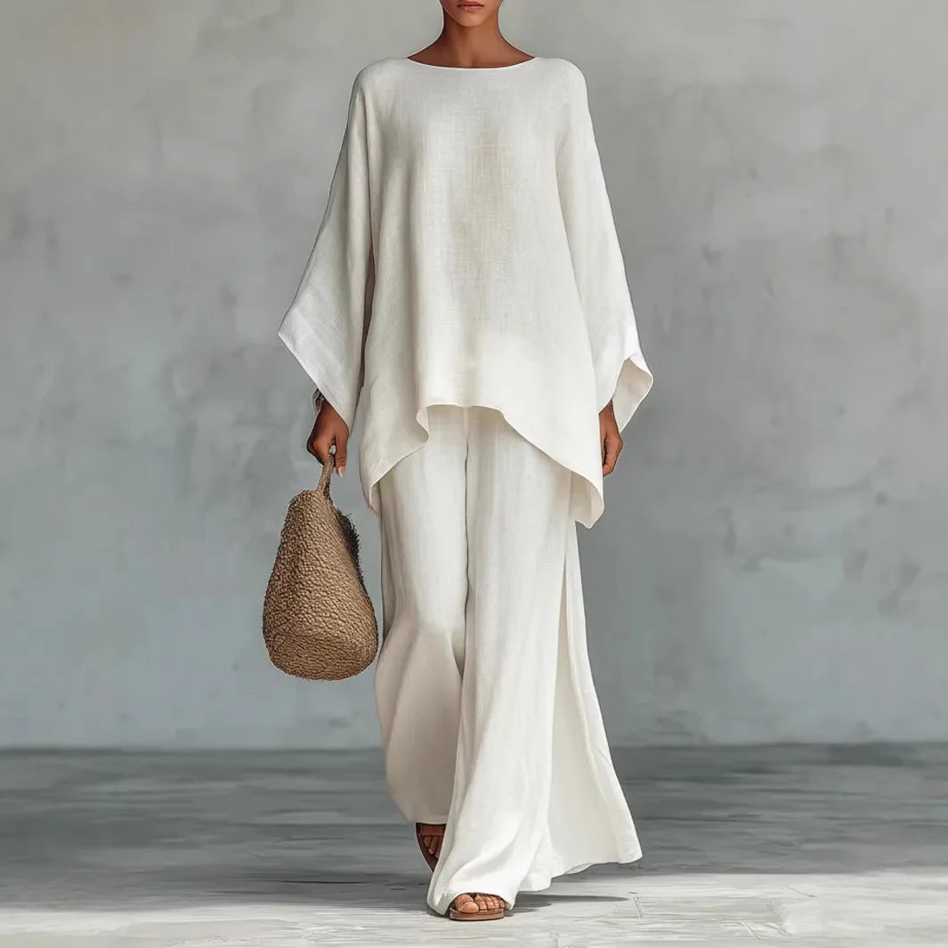Women's comfortable relaxed fit linen two-piece set. Includes a breathable top and wide-leg pants for summer.