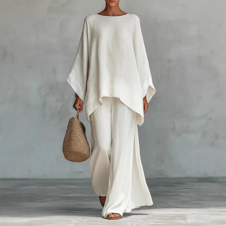 Women's comfortable relaxed fit linen two-piece set. Includes a breathable top and wide-leg pants for summer.