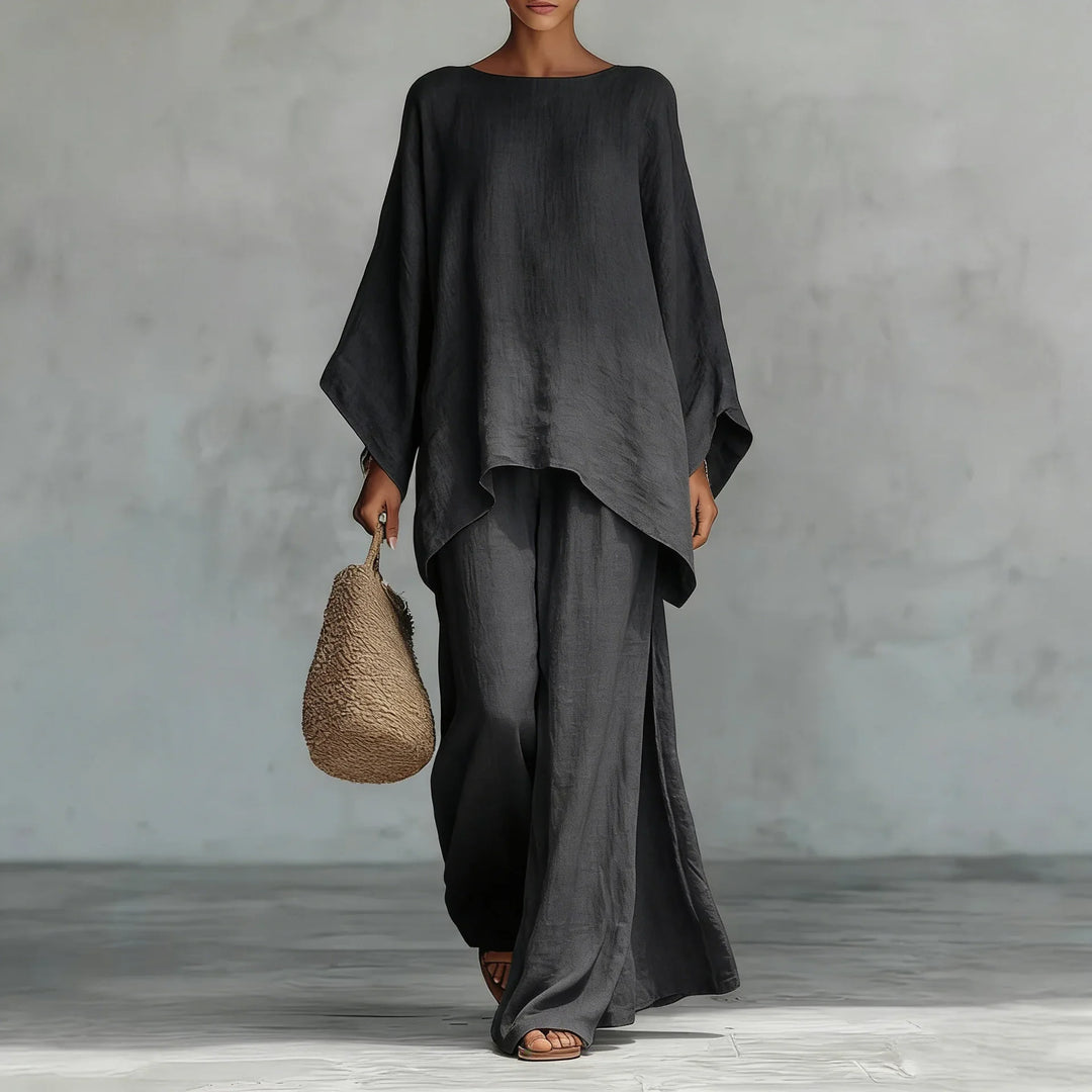 Women's breathable linen two-piece set featuring a relaxed fit top and fashionable wide-leg pants.