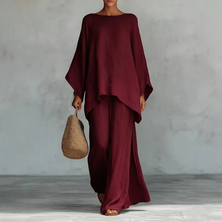 Lightweight women's linen two-piece set for summer. Relaxed top and wide-leg pants offer breathable comfort.