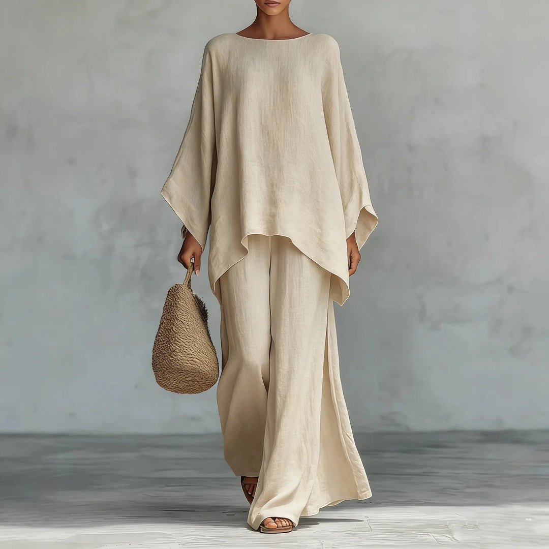 Casual women's linen two-piece with a relaxed fit top and wide-leg pants. Comfortable and elegant for summer.