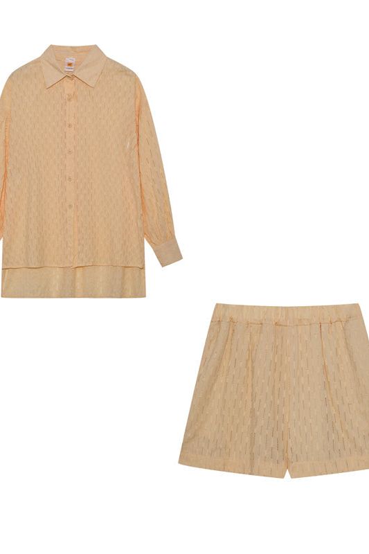 Women's comfortable two-piece shirt & shorts, ideal for casual spring & summer activities.
