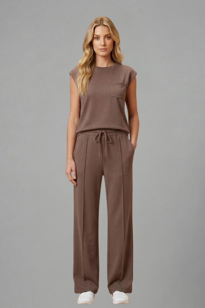 Simple and comfortable women's short-sleeve top and shorts lounge set in a solid color.