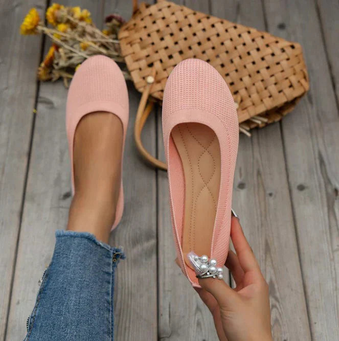 Side view of women's comfortable slip-on ballet flats, highlighting the flexible design for everyday use.