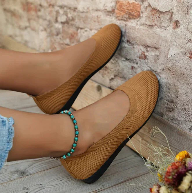 Durable women's ballet flats with non-slip sole, ensuring comfort and stability for all-day slip-on wear.